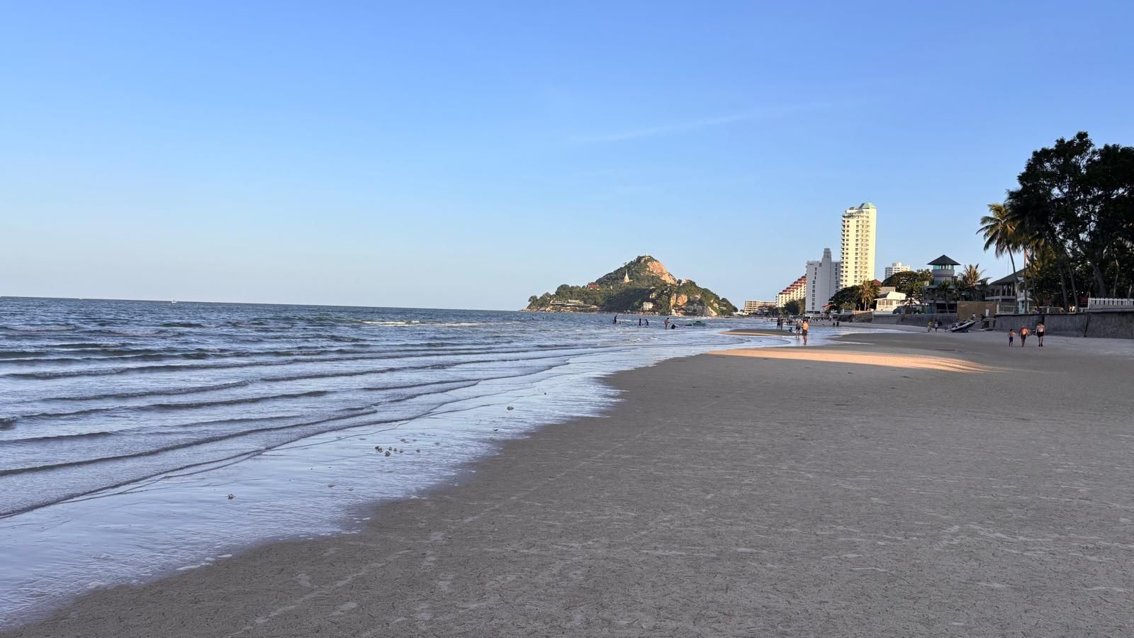 Hua Hin beach in the late afternoon sun.